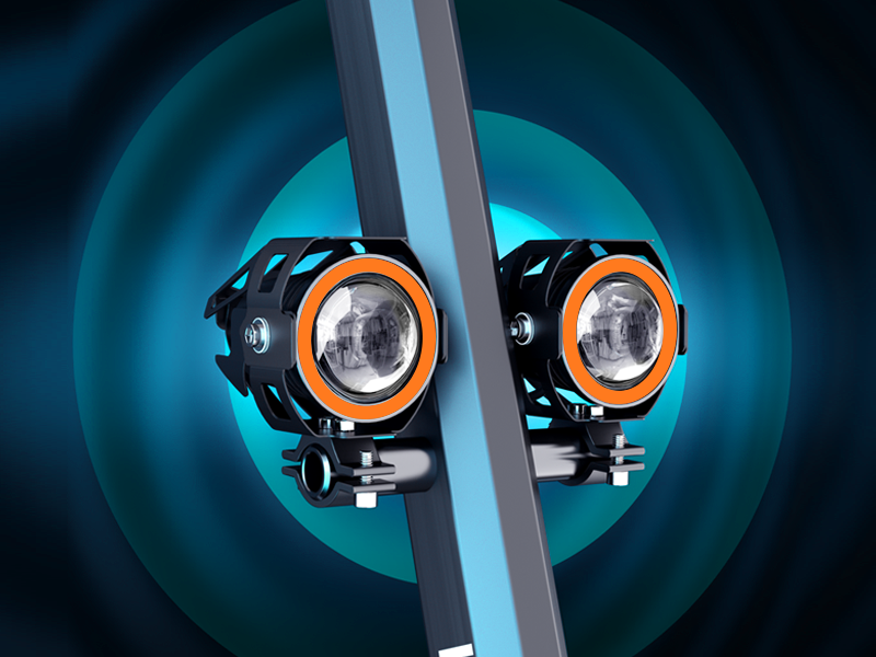 The two stem-mounted headlights on a Hiboy TITAN electric scooter, lit