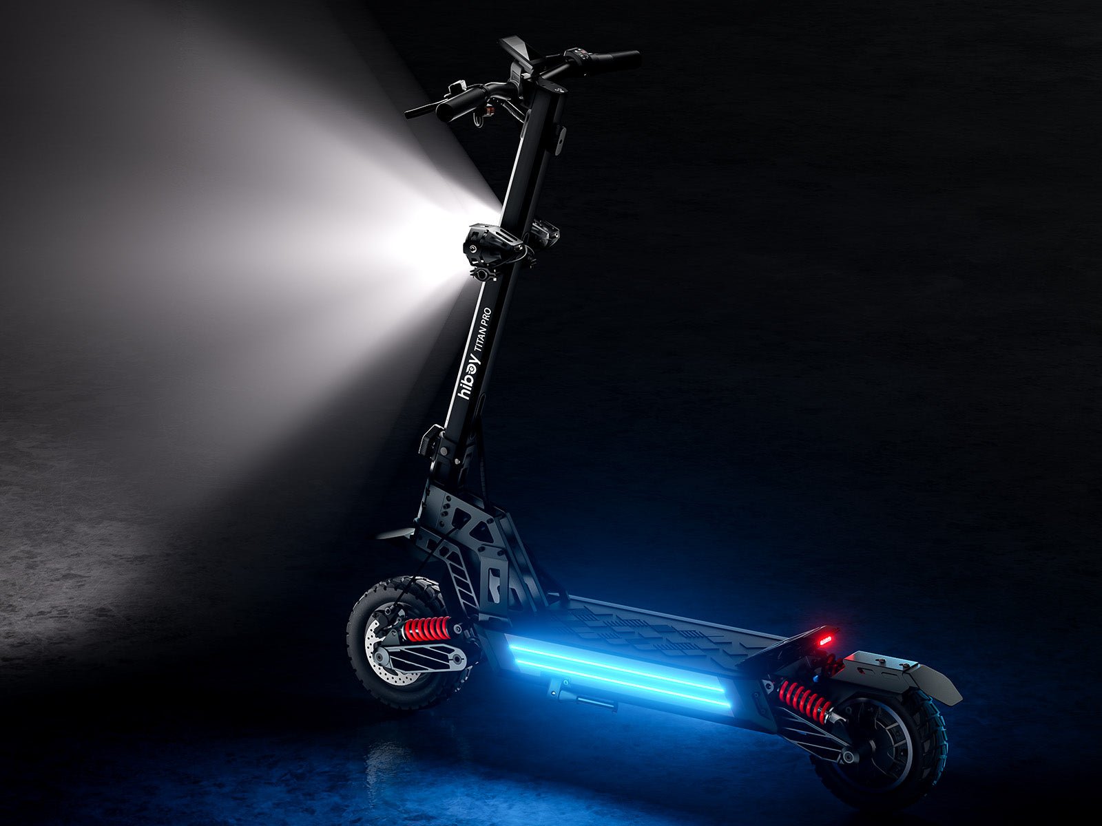 Twin stem-mounted headlights throwing a beam down a dark road, deck lighting glowing blue beneath
