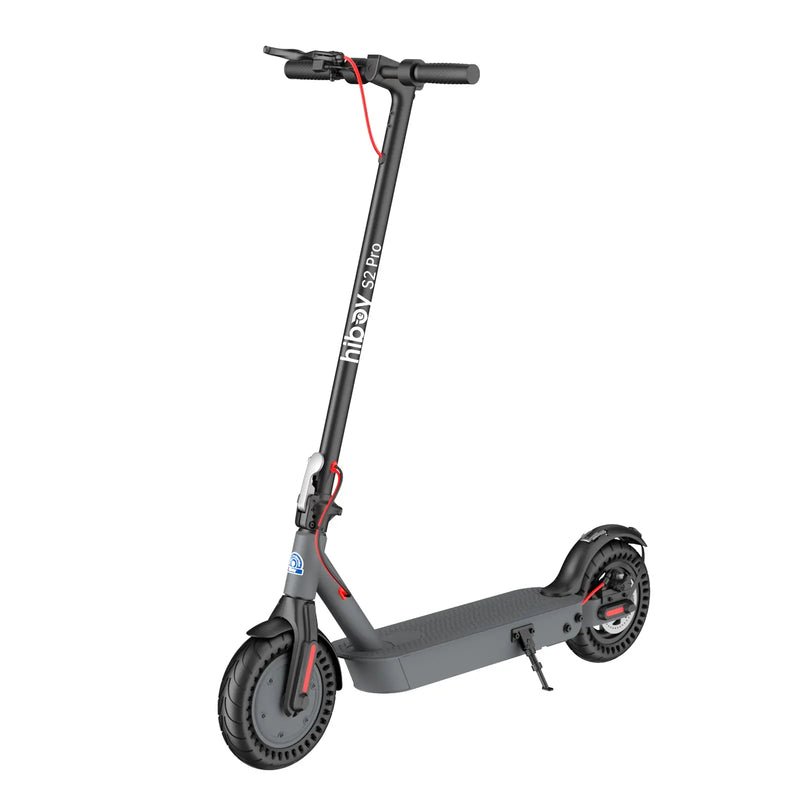 Folded Hiboy S2 Pro electric scooter being loaded into a car trunk