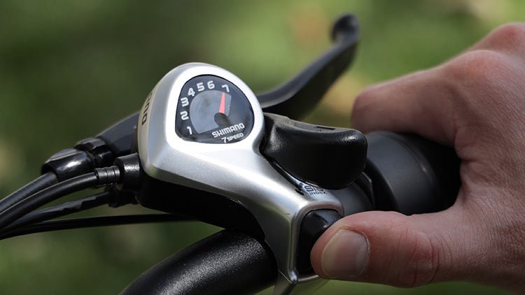 Close view of the 20 by 4 inch fat tire and wheel on the Hiboy EX6 step-thru electric bike