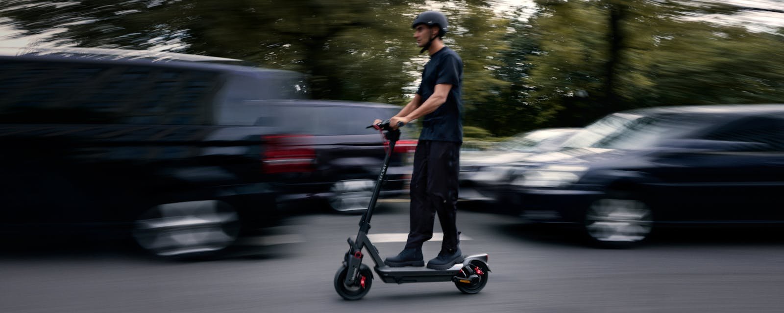 Segway Max G3 electric scooter being ridden through city traffic