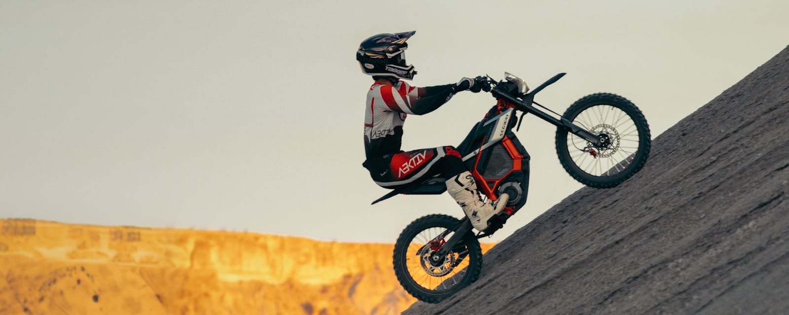 The Segway Xaber 300 electric dirt bike on a slope