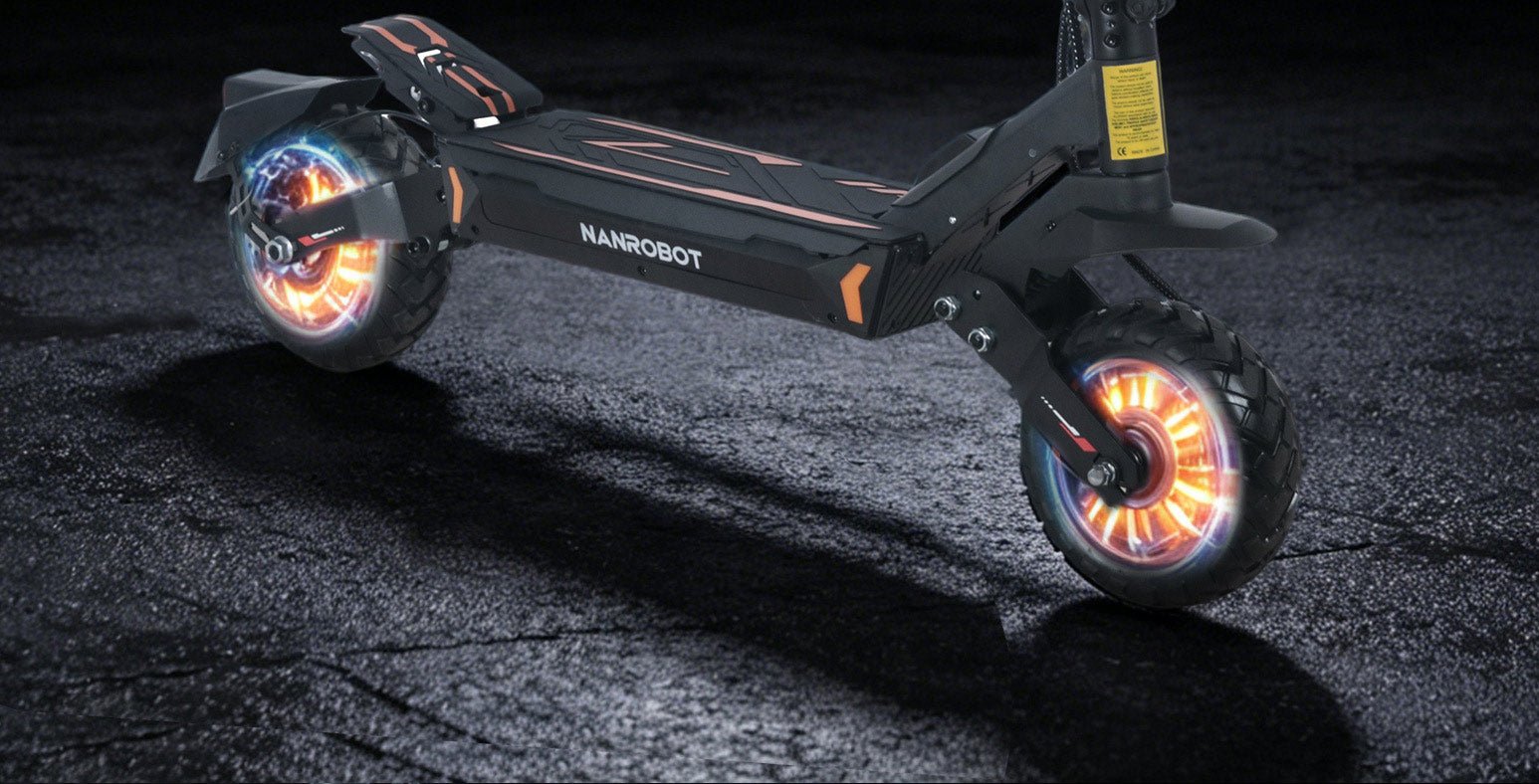 Nanrobot G2 rear wheel motors glowing on wet asphalt