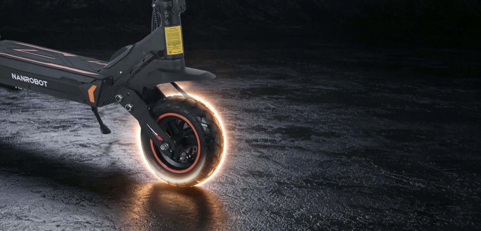 Nanrobot G2 10-inch all-terrain tire glowing at the rear swingarm