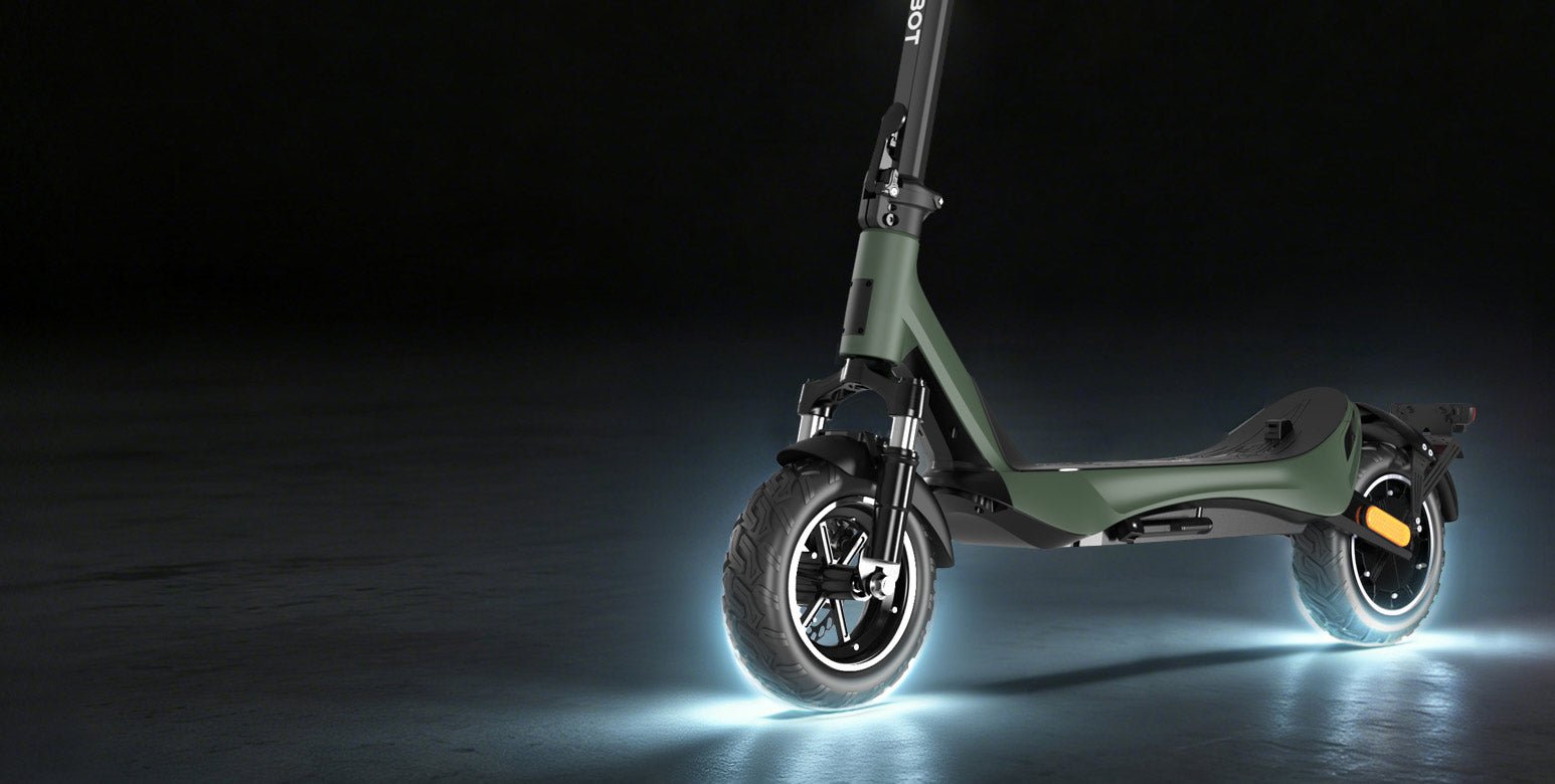 Nanrobot C1 Pro folding handlebars beside its glowing rear wheel