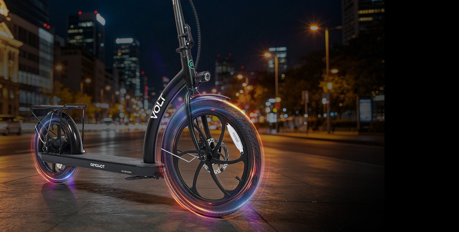 AINOHOT VOLT 20-inch front wheel glowing as it rolls through the city