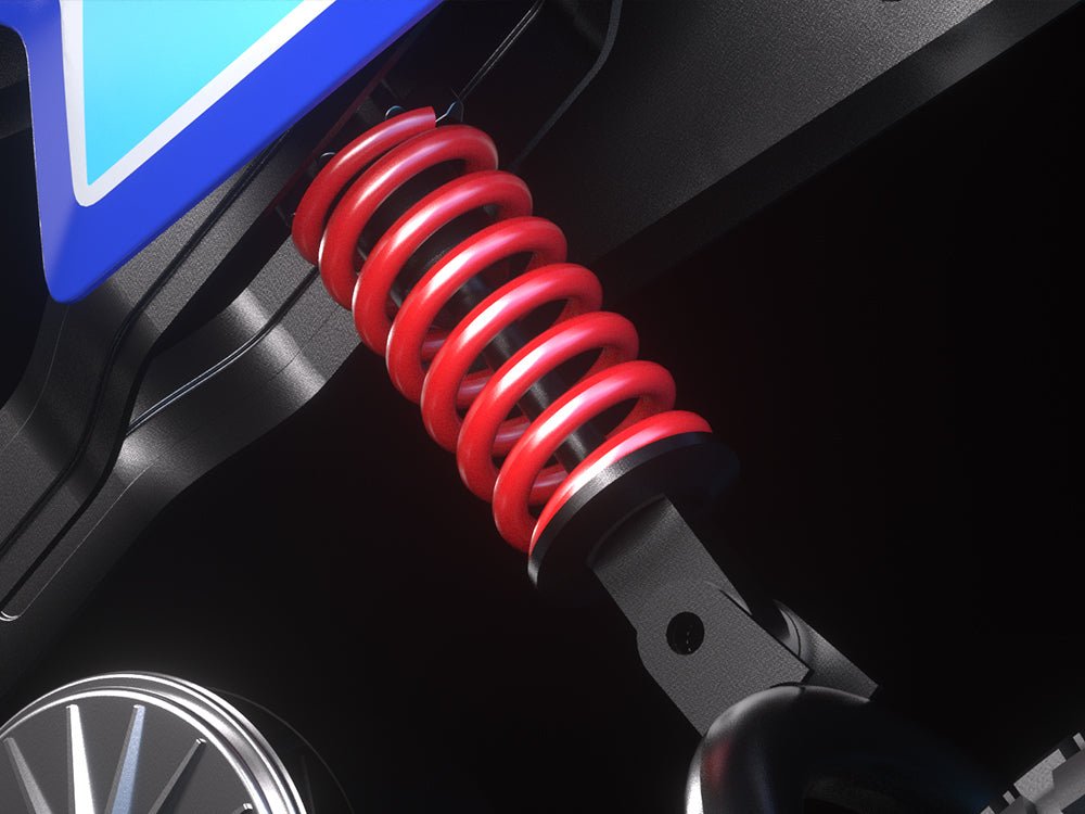 Close view of the rear coil-over shock absorber on the Hiboy DK1 electric dirt bike