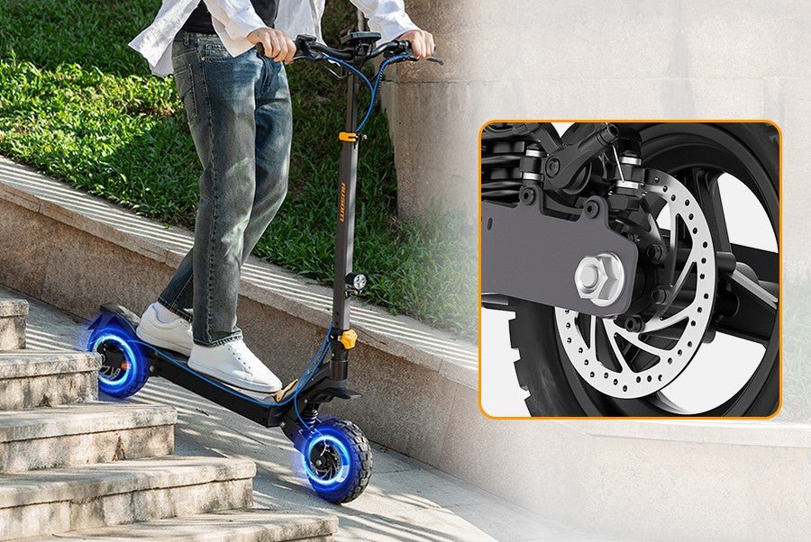 Rider taking the Ausom L1 electric scooter down outdoor steps, with an inset of the rear disc brake