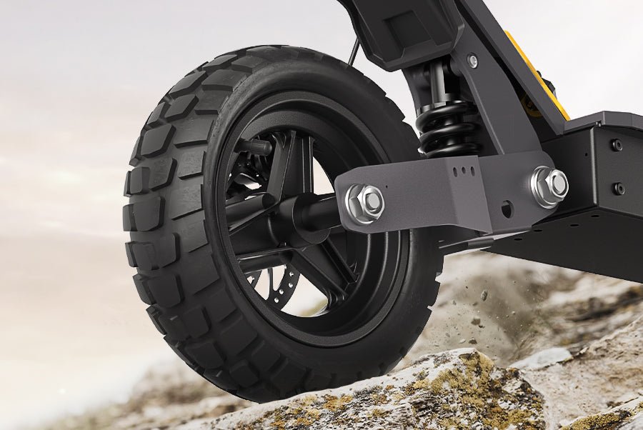 Deep multi-directional tread on the Ausom L1 electric scooter's 10 inch tubeless front tire