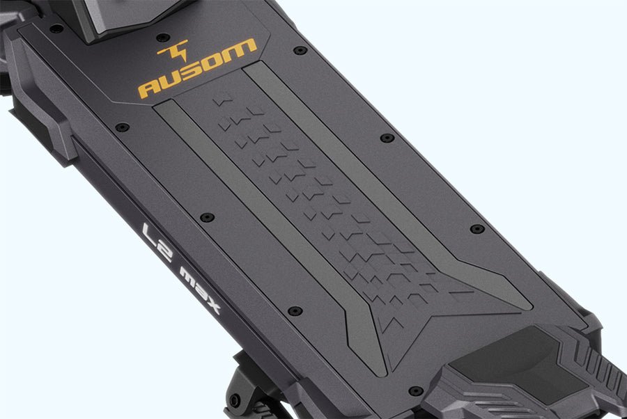 Wide textured deck of the Ausom L2 Max dual motor e-scooter viewed from above