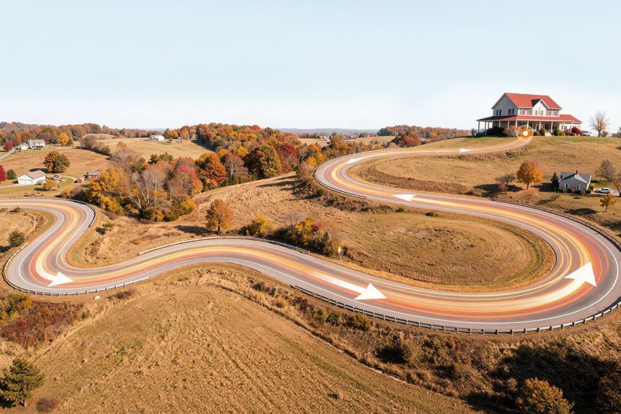 Winding country road with an illuminated path drawn along it, Ausom's range artwork for the K20 Pro dual motor e-scooter