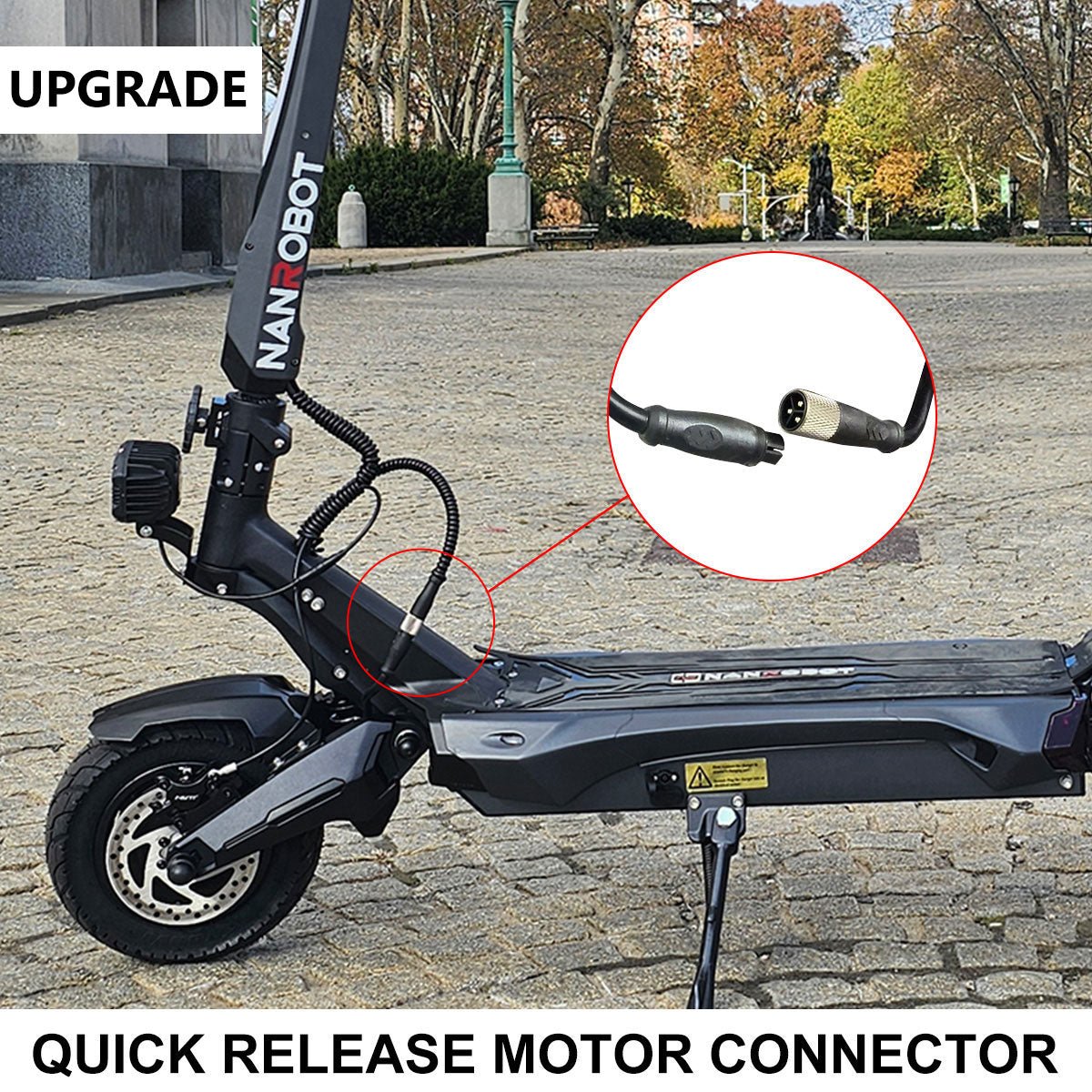 Close-up of the Nanrobot N6 quick-release motor connector at the front wheel