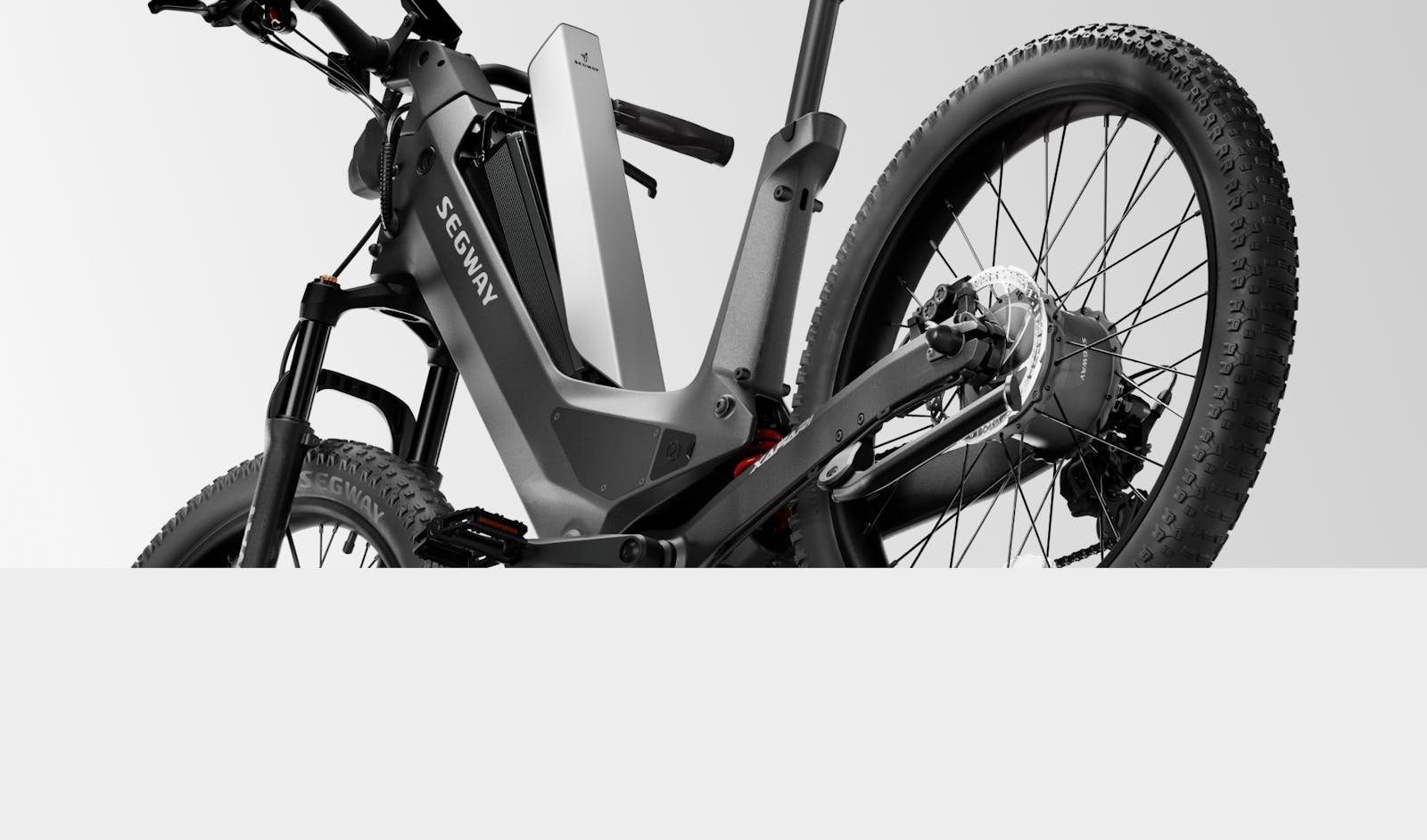 Segway Xafari fat tire electric bike being ridden on a trail