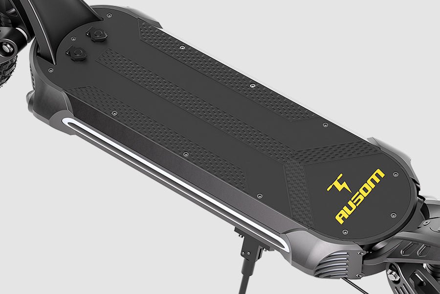 Textured non-slip deck of the Ausom SR1 electric scooter viewed from above