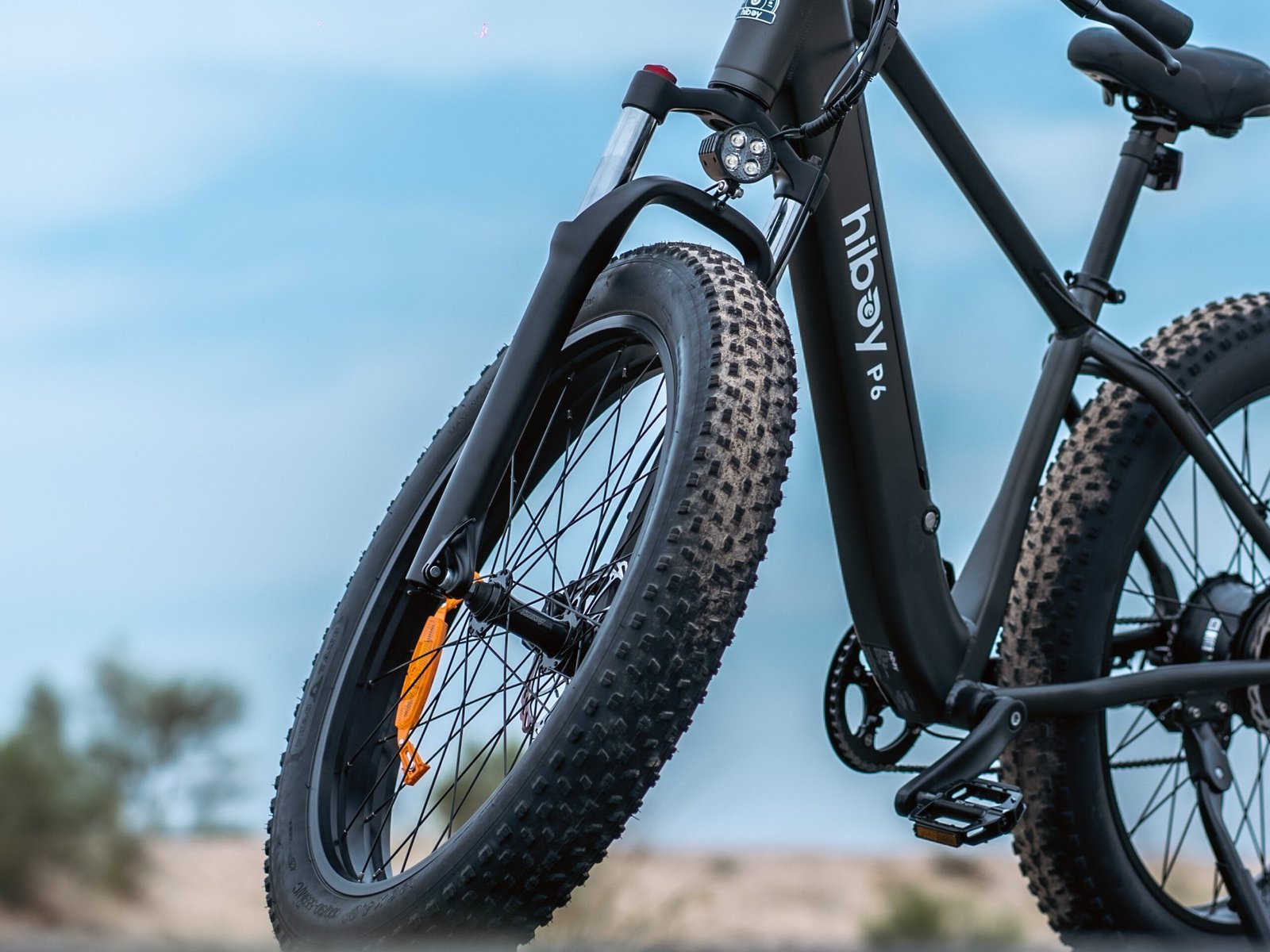 Close view of the 26 by 4 inch fat tire and its tread pattern on the Hiboy P6 electric bike