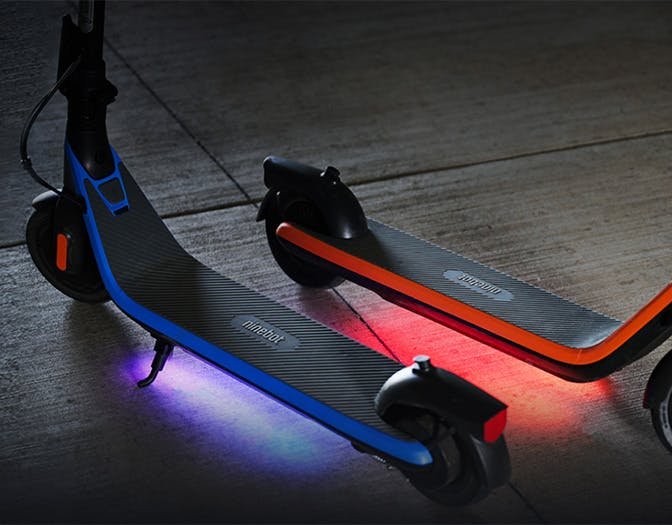 Segway Ninebot C2 Pro with RGB ambient lights glowing under the deck