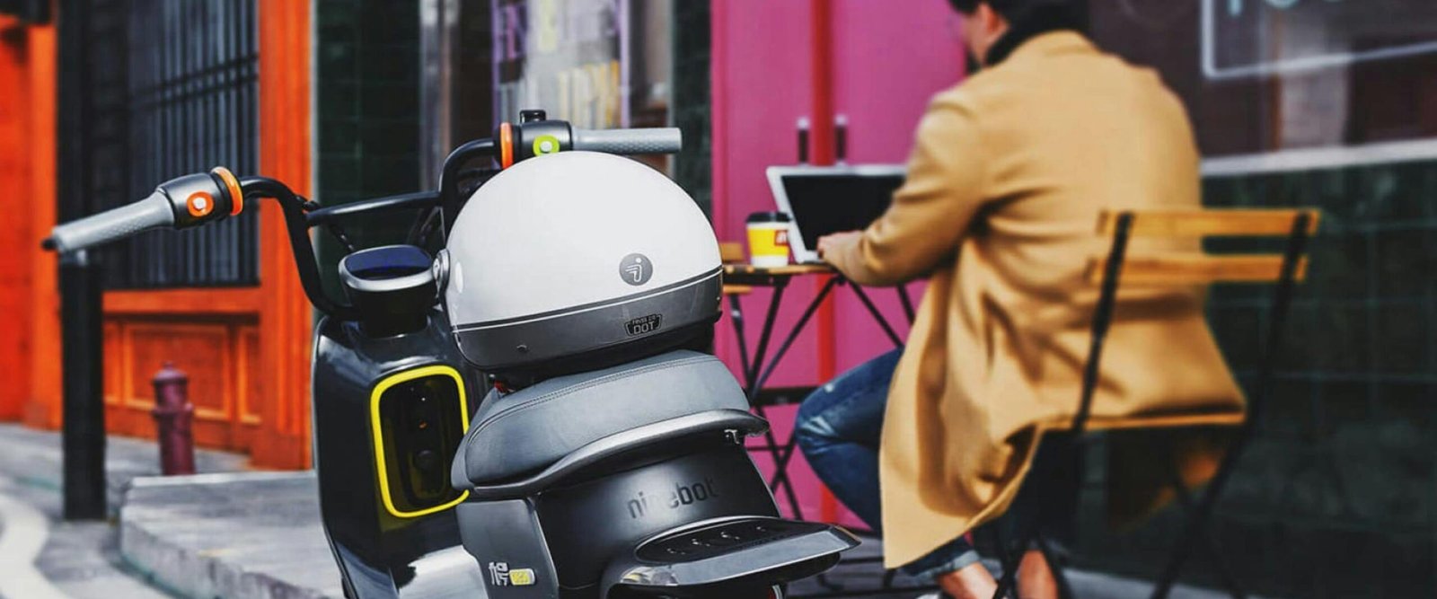 Segway eMoped C80 parked outside a cafe