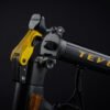 Yellow folding latch on the Teverun Blade Mini Ultra electric scooter