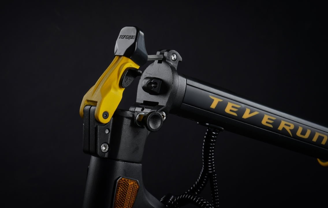 Yellow folding latch on the Teverun Blade Mini Ultra electric scooter