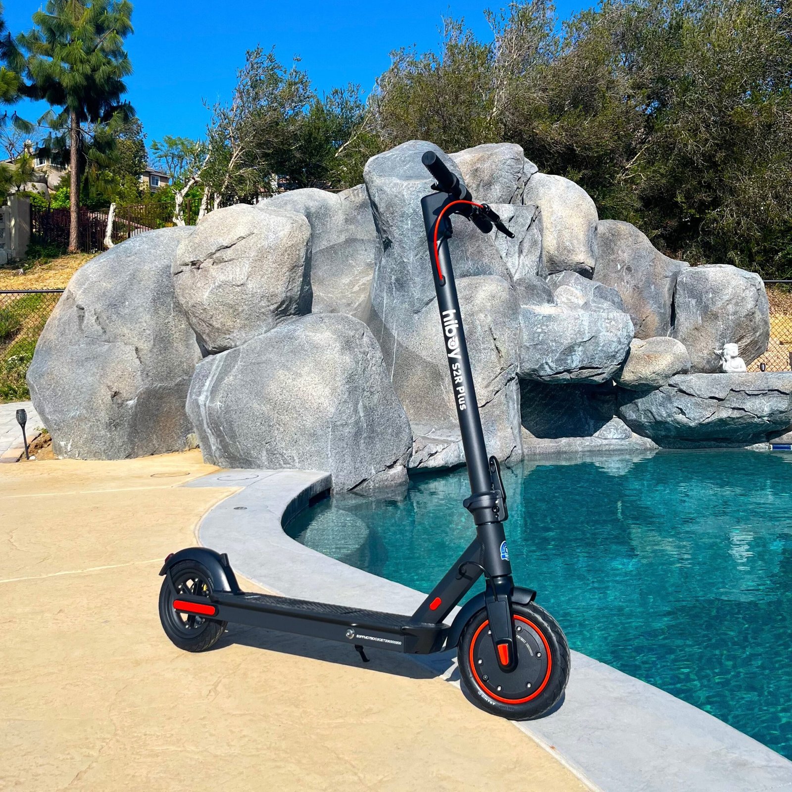 Hiboy S2R Plus electric scooter standing beside a pool