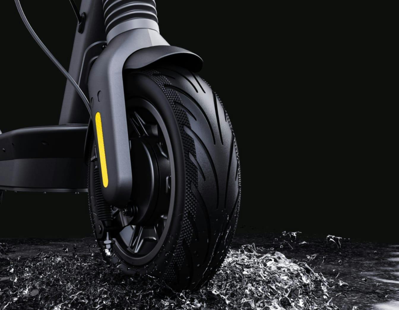 Front wheel of the Segway Ninebot Max G2 electric scooter splashing through water