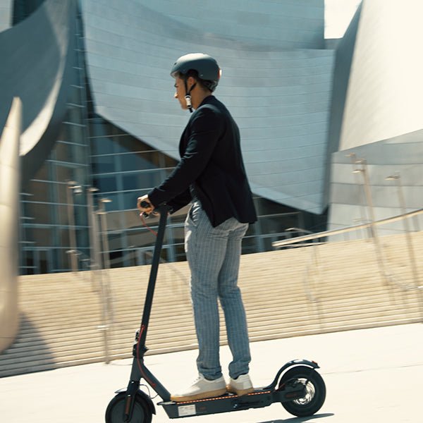 Rider on the Hiboy S3 electric scooter in the city