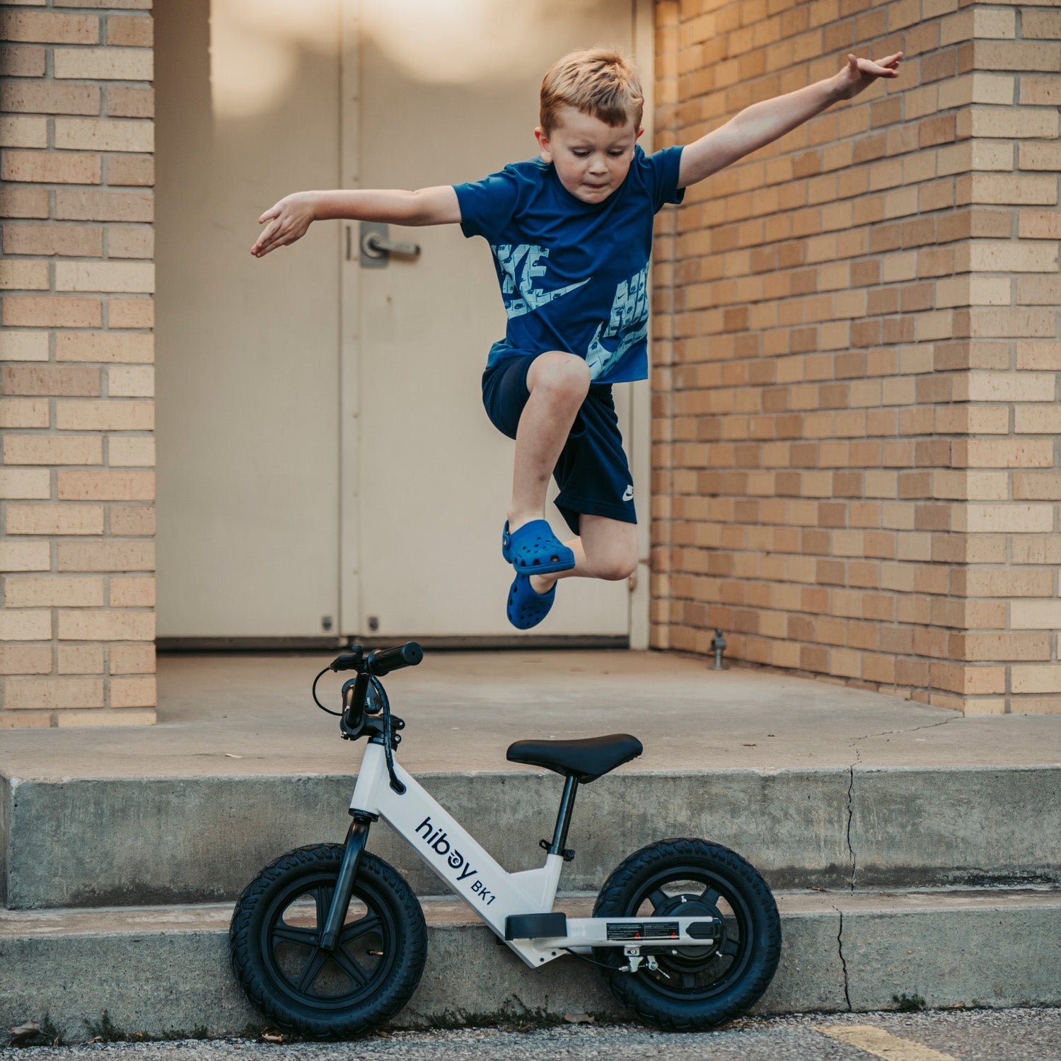 Child gliding on the Hiboy BK1 electric balance bike