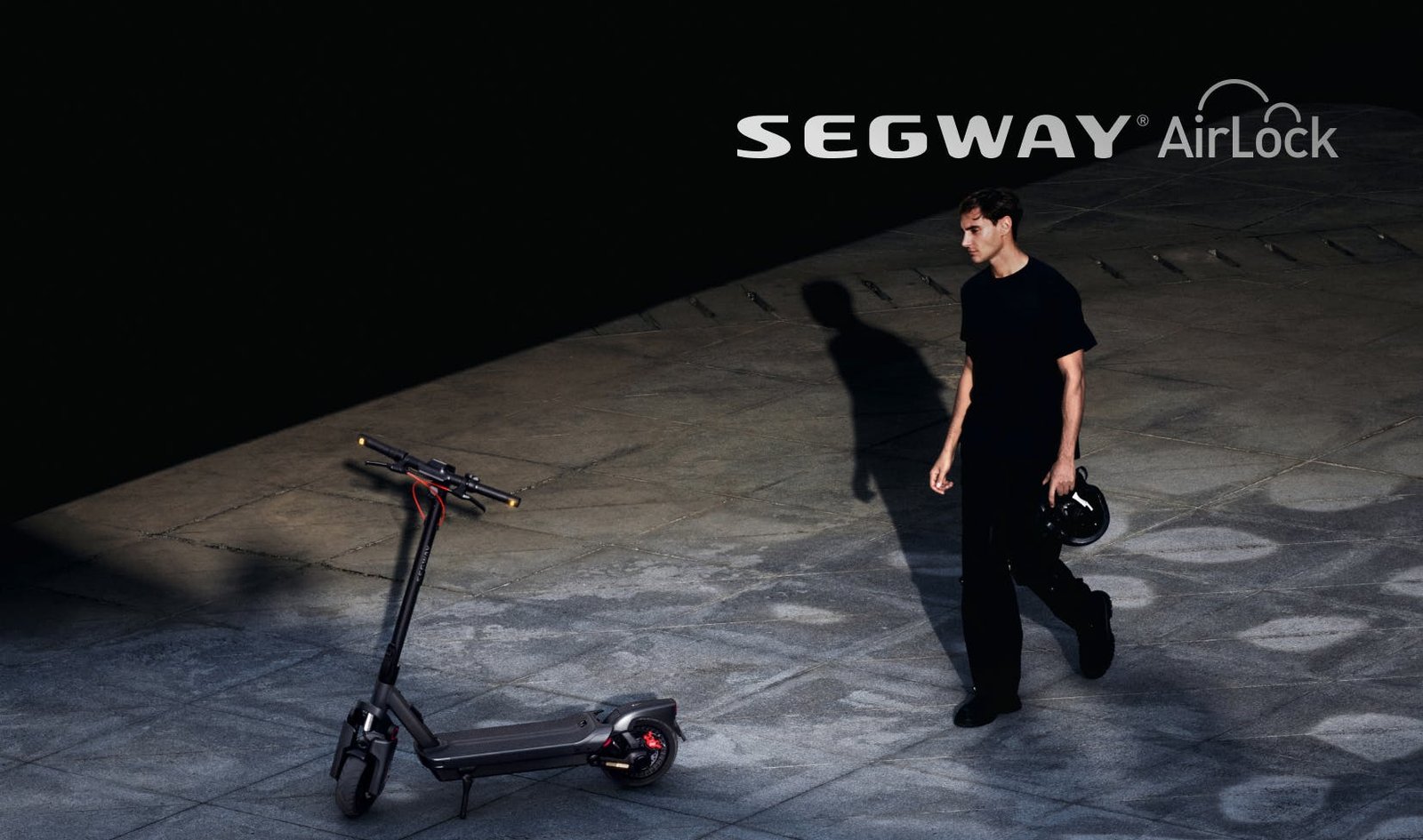 Rider walking up to the Segway Max G3 electric scooter as it unlocks automatically