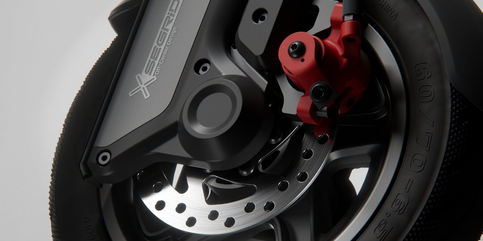 Front disc brake with red caliper on the Segway F3 electric scooter