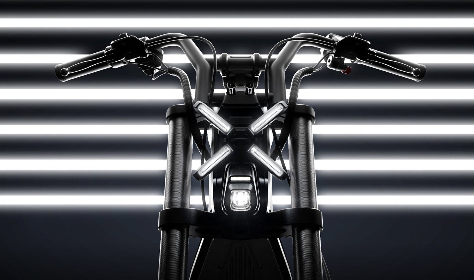X-shaped headlight of the Segway Xyber electric bike lit up