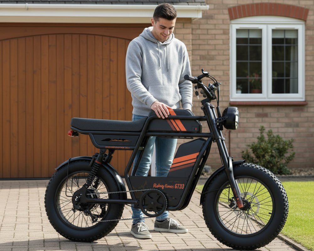 Rider wheeling the Riding’times GT33 cargo electric bike out of a garage
