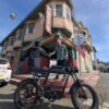 Riding’times GT33 cargo electric bike rider at a suburban intersection