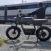 Riding’times GT33 cargo electric bike rider beside a passing train