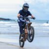 Riding’times GT73 Pro electric motorbike ridden across a wet beach