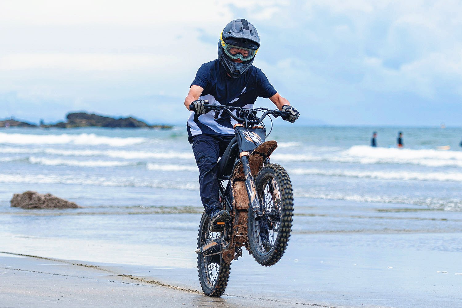 Riding’times GT73 Pro electric motorbike ridden across a wet beach