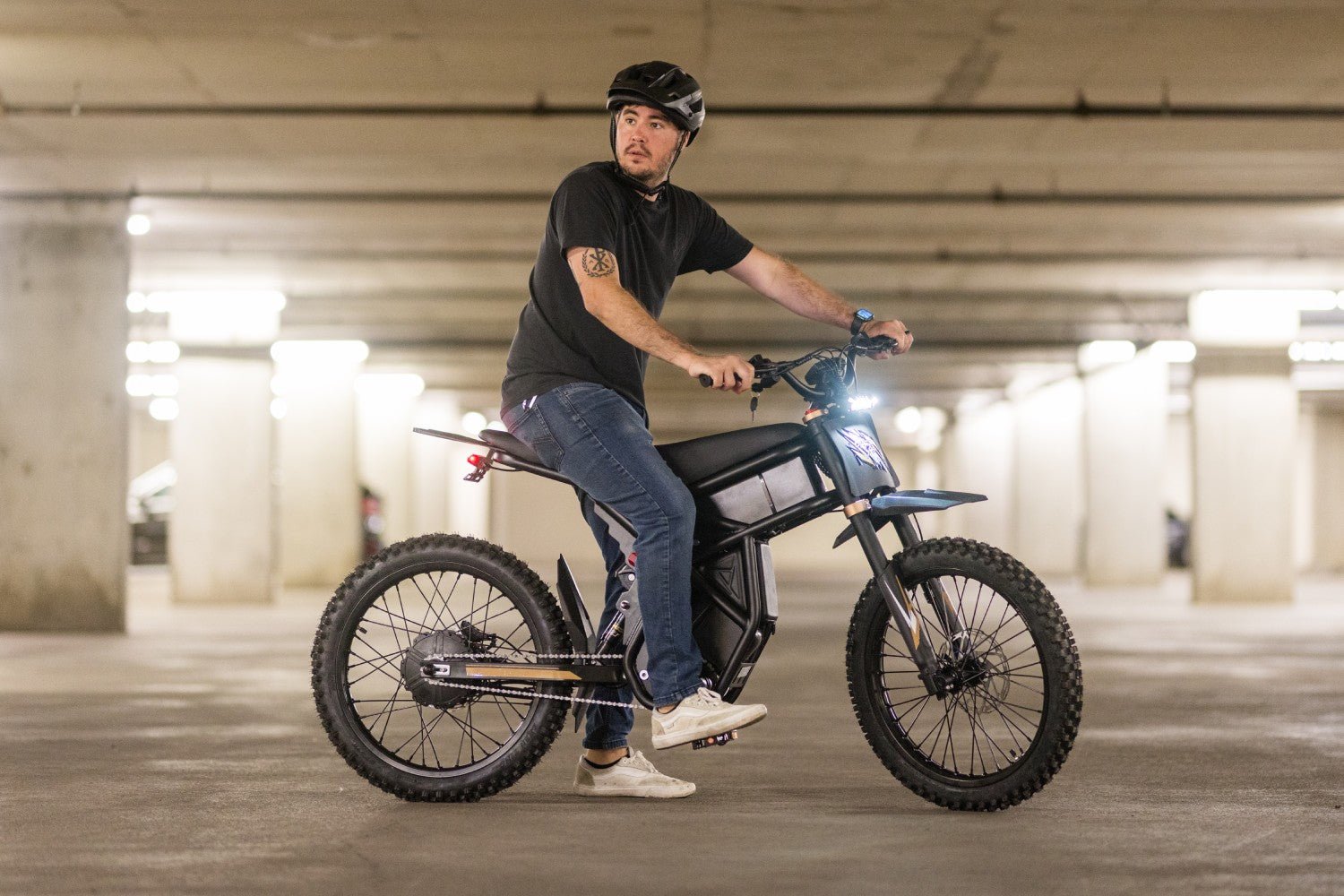 Riding’times GT73 Pro electric motorbike ridden through an underground car park