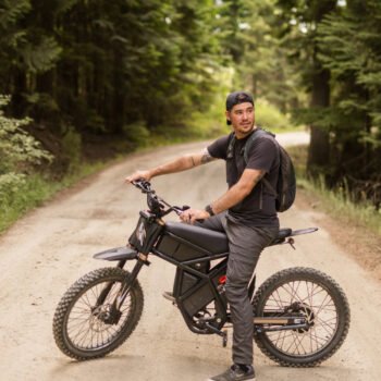 Riding’times GT73 Pro electric motorbike ridden along a forest gravel road