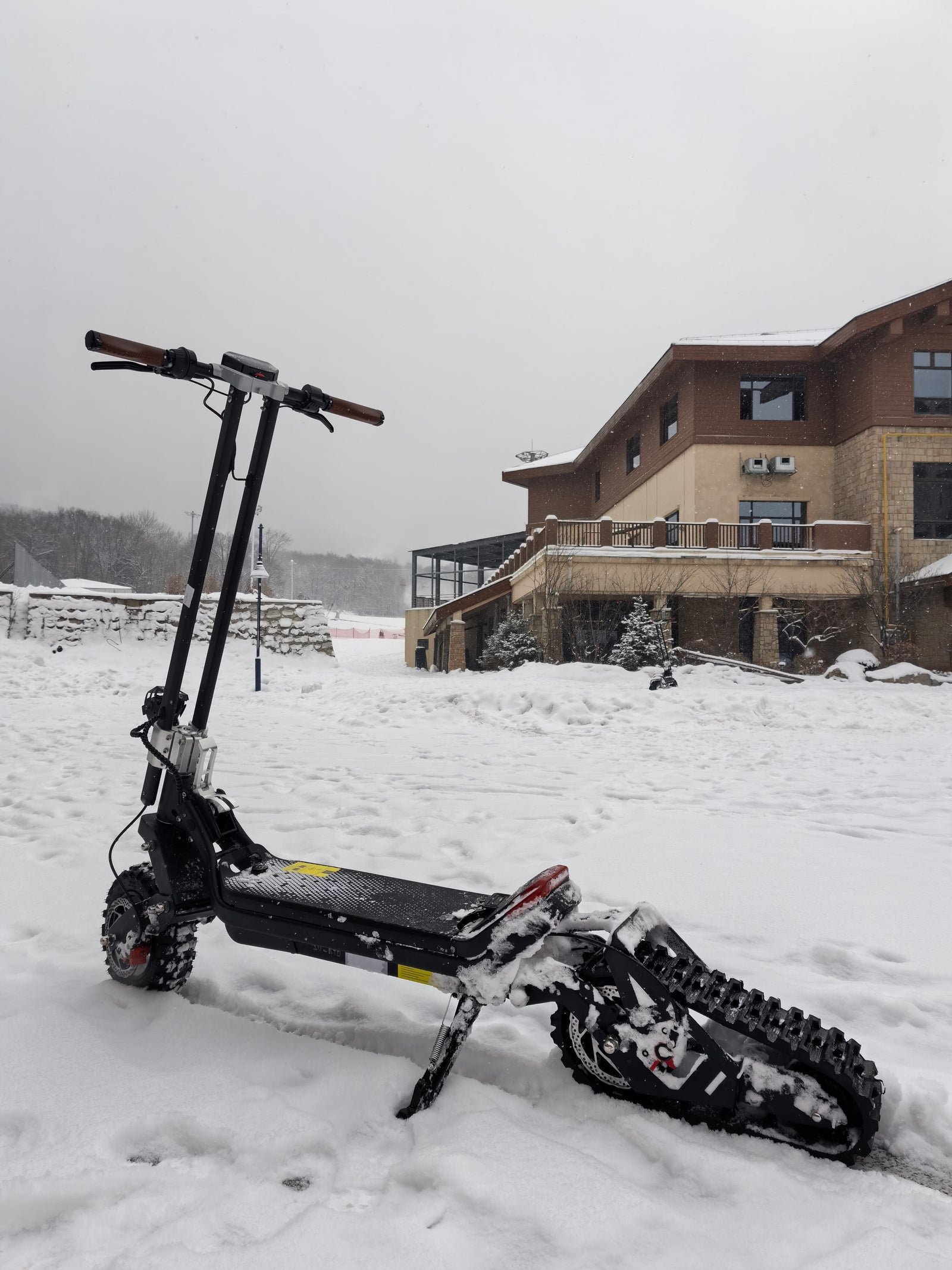 Riding’times G63 Convertible with ski kit in snow outside a lodge