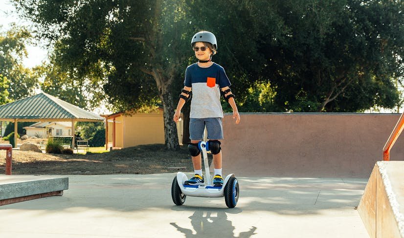 Child riding the Segway Ninebot S2 Kids in a skate park