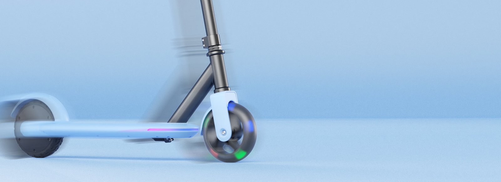 Hiboy ES1 kids electric scooter in motion with its light-up front wheel
