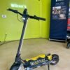 Punk Rebel electric scooter on the floor of a Wilson’s shop