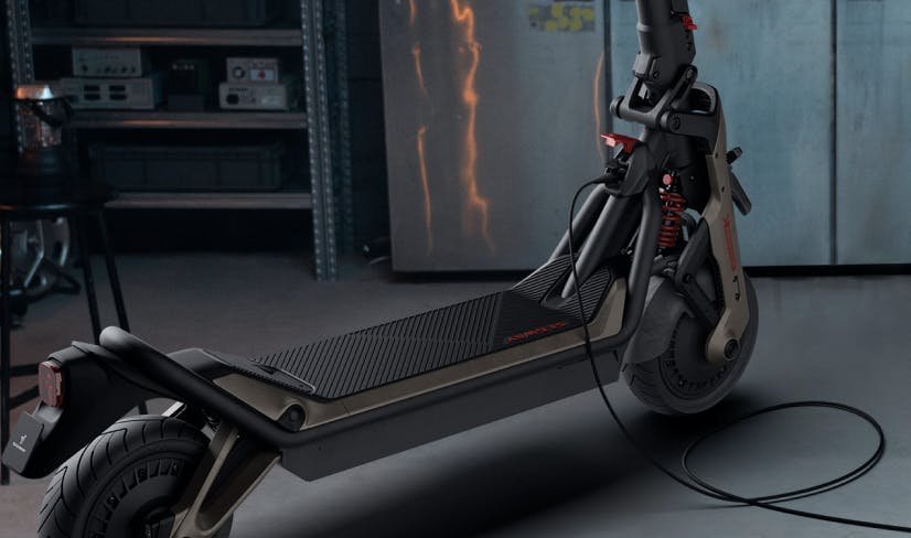 Segway GT3 Pro SuperScooter charging in a workshop