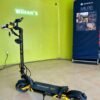 Teverun Blade Mini Ultra electric scooter on the floor of a Wilson’s shop