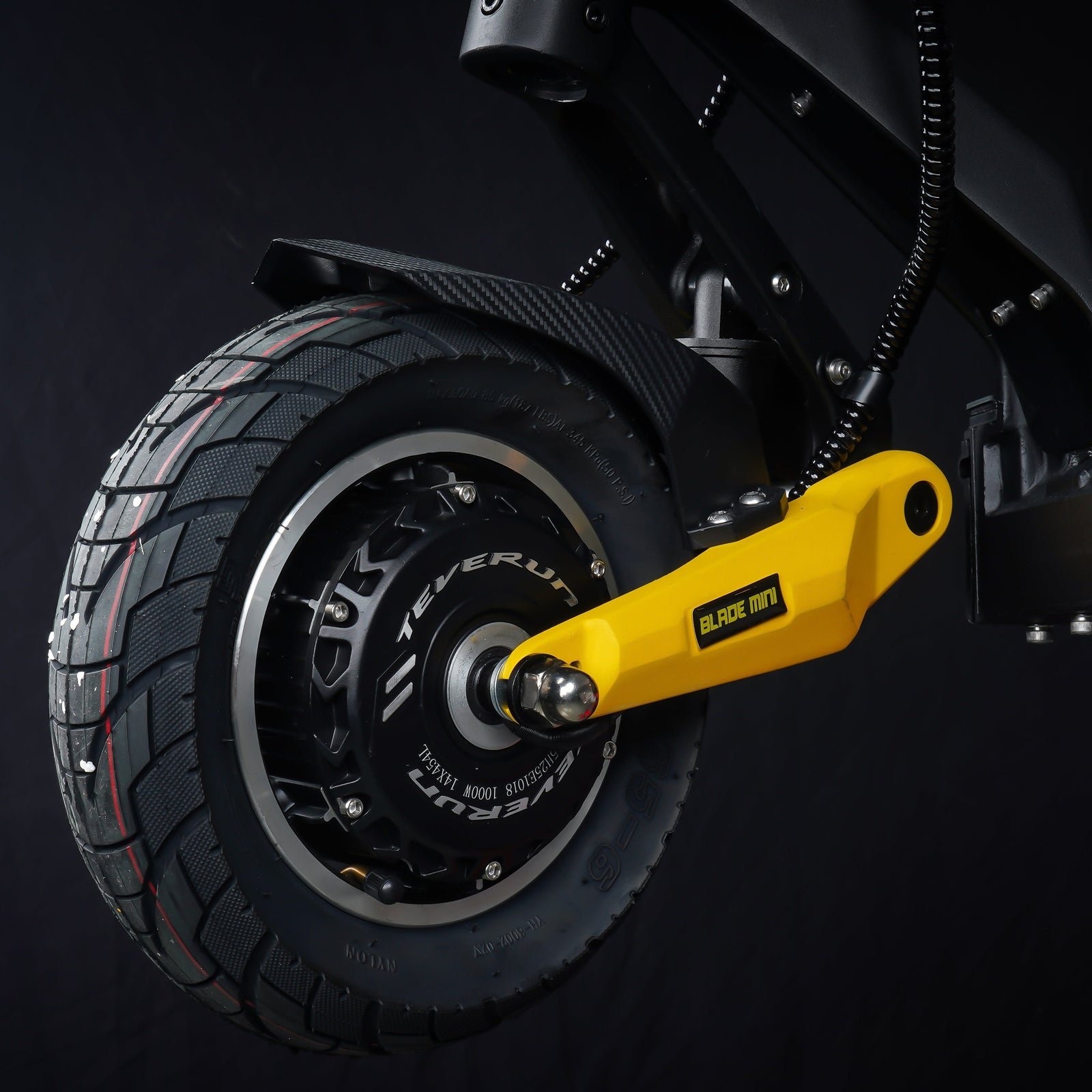 Rear hub motor and yellow swingarm on the Teverun Blade Mini Ultra electric scooter