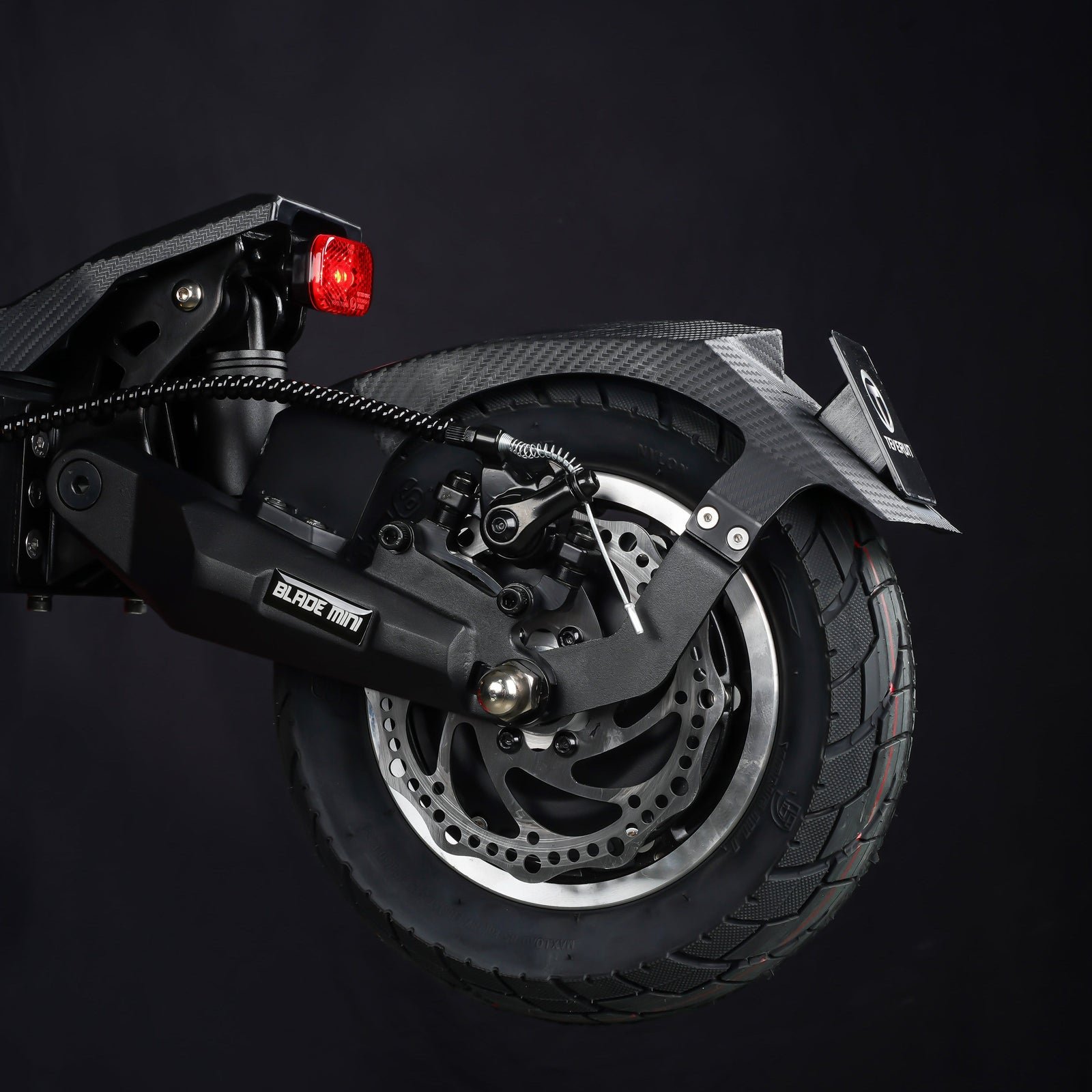 Rear wheel, disc brake and tail light of the Teverun Blade Mini Pro electric scooter