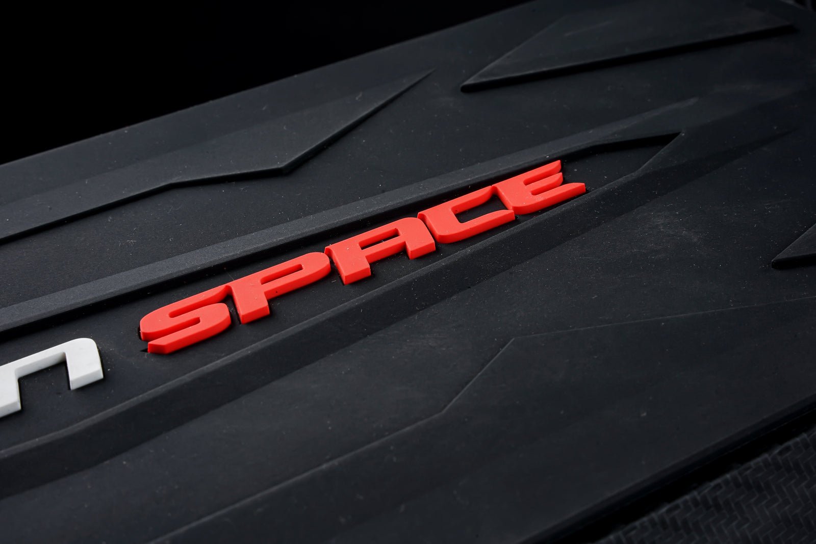 Space lettering on the deck of the Teverun Space Lite electric scooter