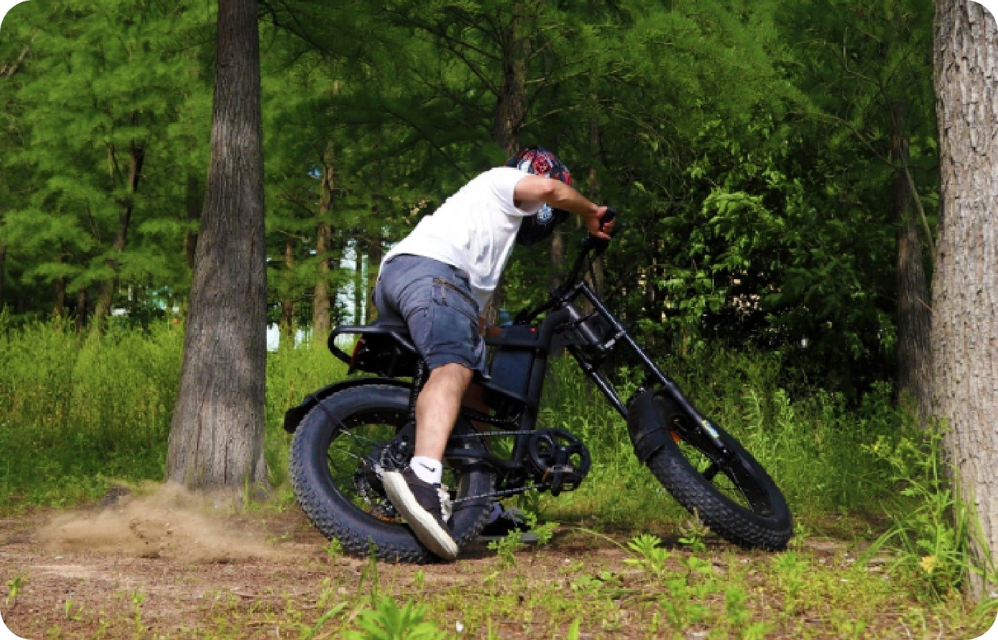 Rider on the Riding’times Z8 Pro electric bike in a forest