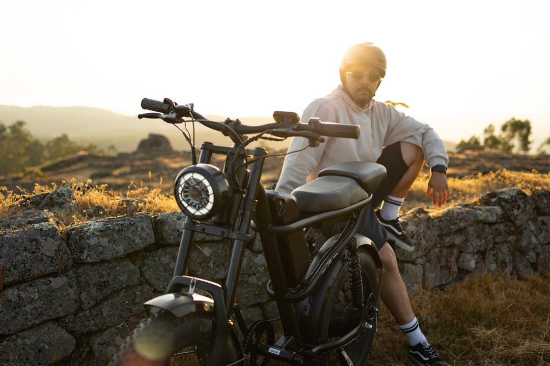 Rider seated on the Riding’times Z8 Pro electric bike at sunset