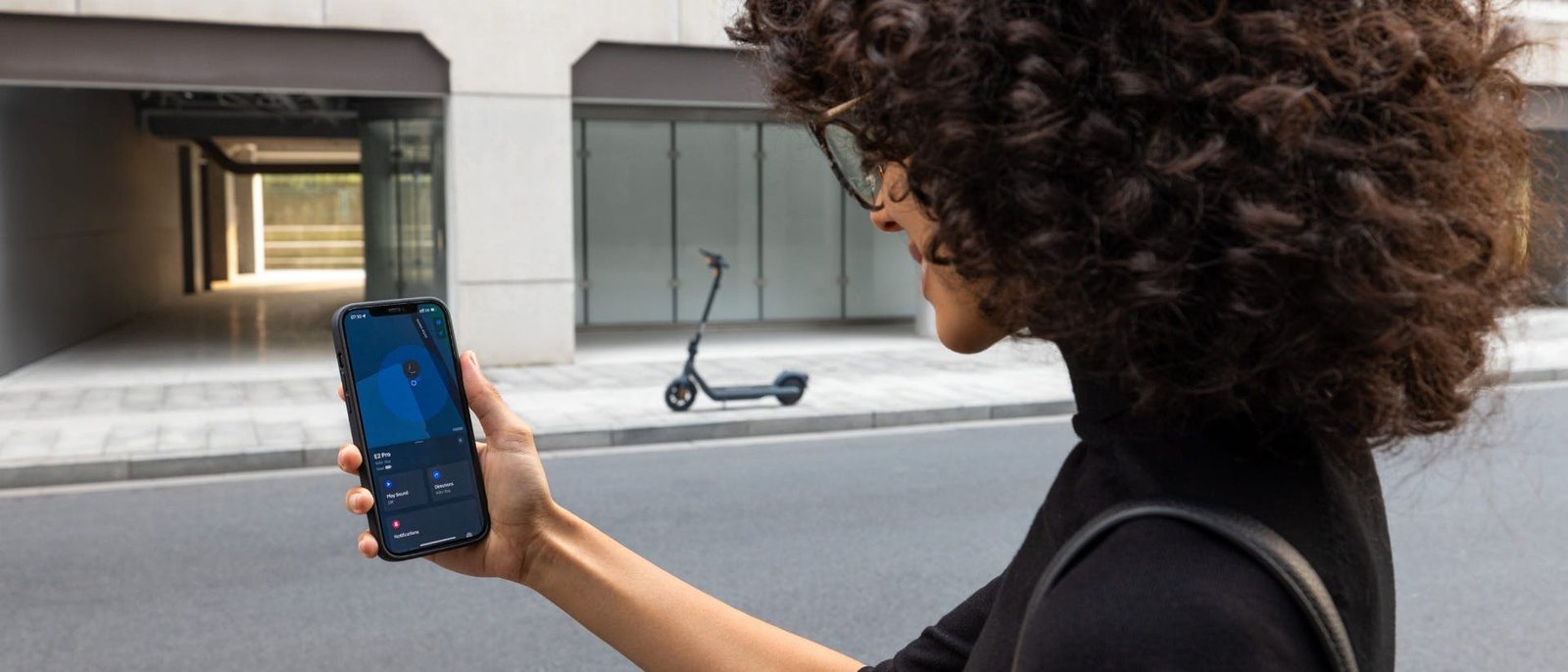 Rider locating the Segway Ninebot E2 Pro electric scooter with the Apple Find My app