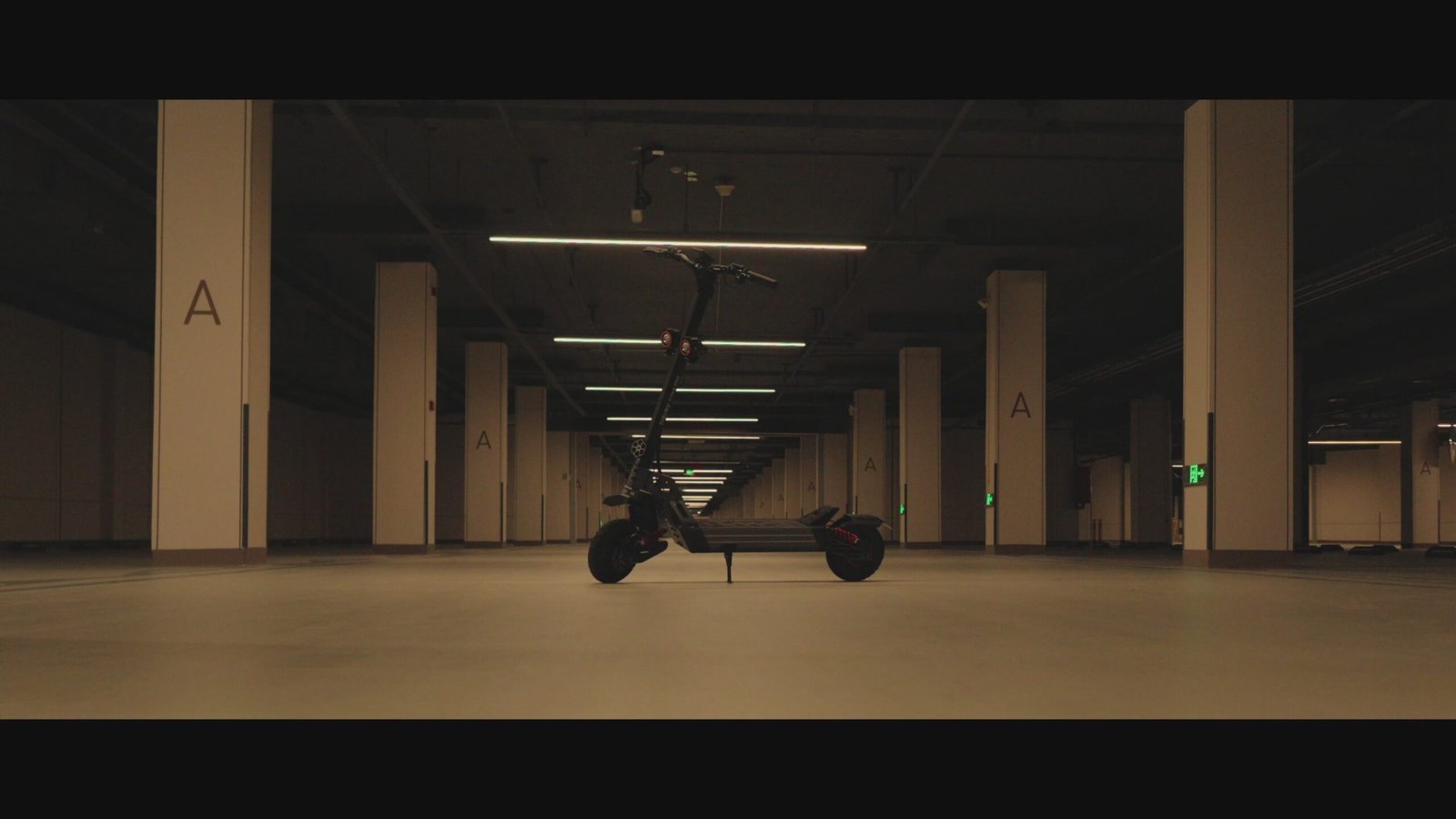 Hiboy TITAN electric scooter standing alone in an empty underground garage